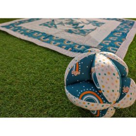 Pelota montessori arcoiris con arrullo